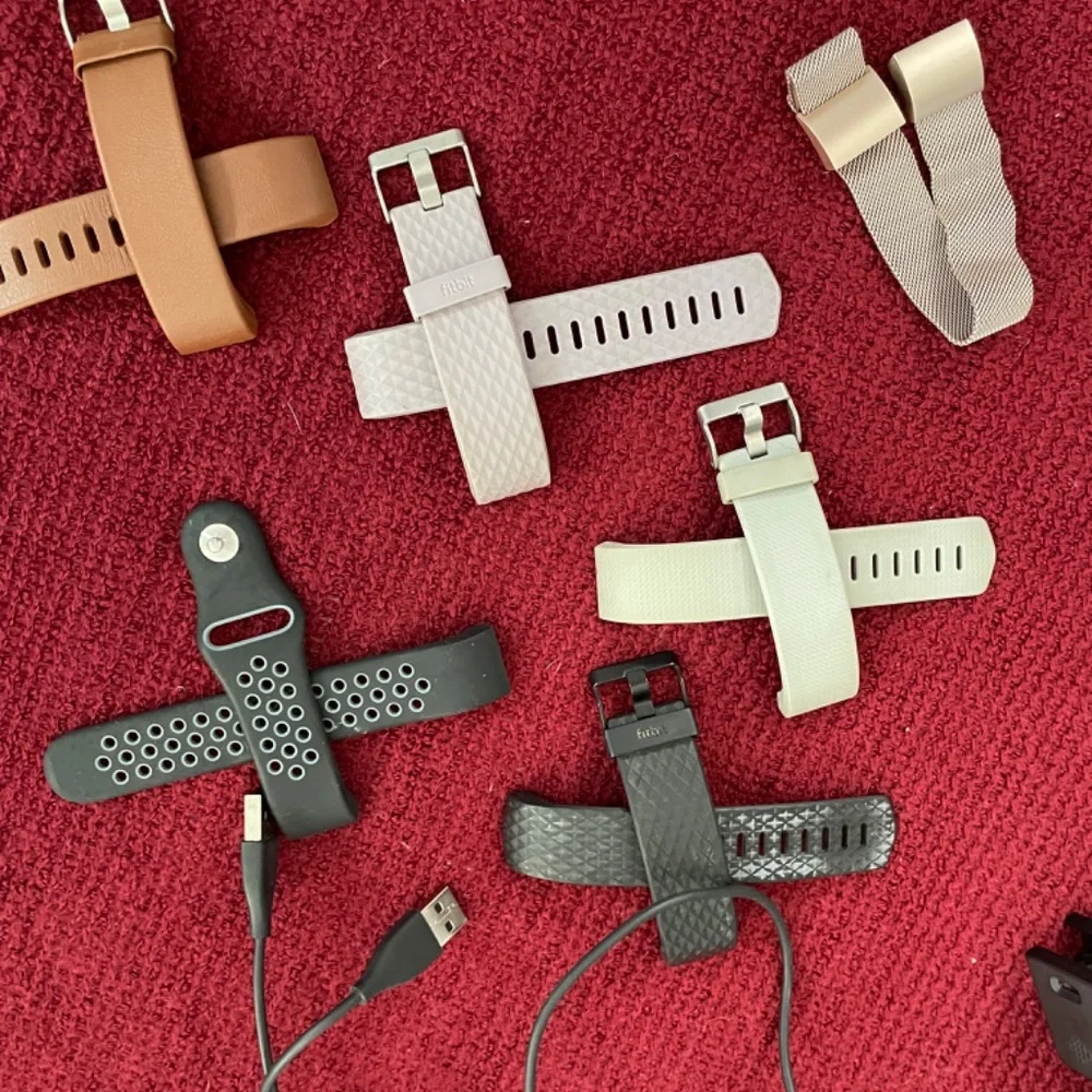 FITBIT BUNDLE-2 Fitbit Charge 2s 407 1 new 1 gently used, 3 chargers 7 straps